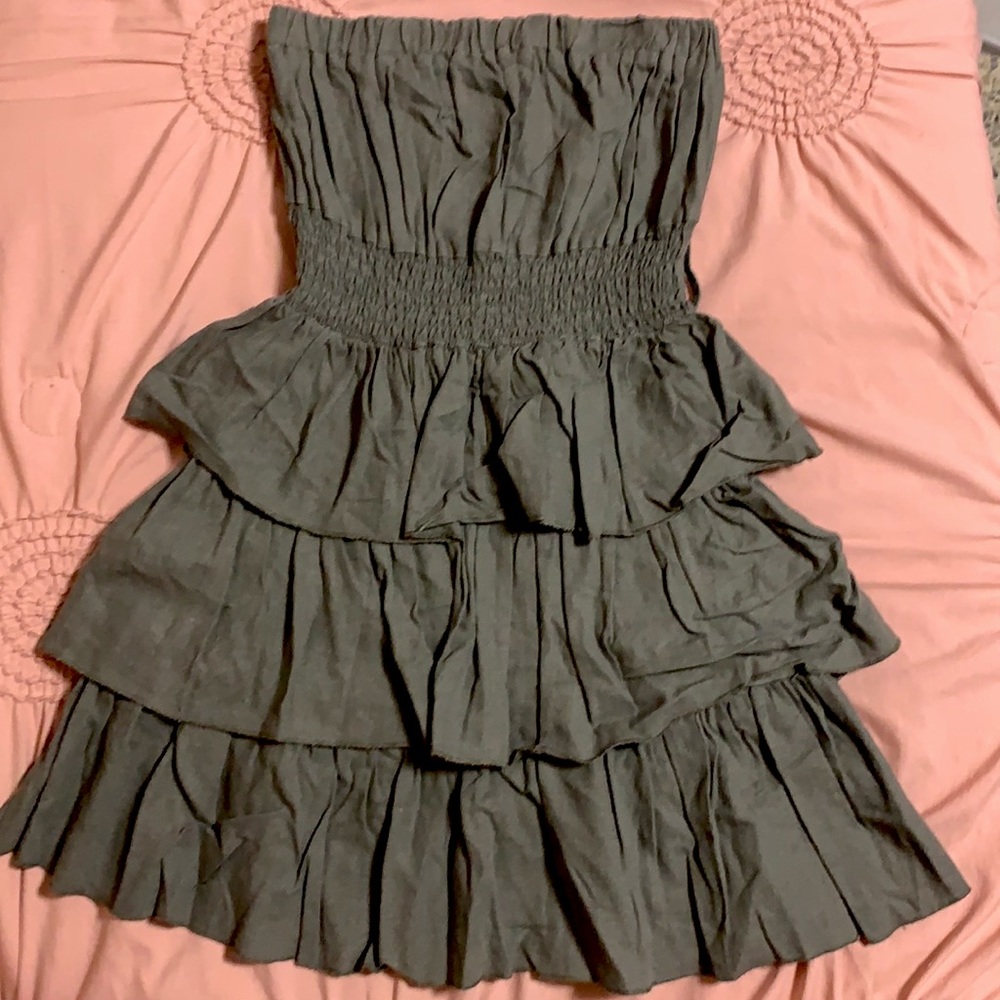 Have dark green dress with elastic and ruffles